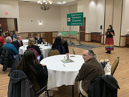 The Sokaogon Chippewa Community and representatives from WisDOT and the Federal Highway Administration at the sign unveiling.