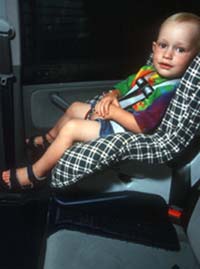 Child in safety seat